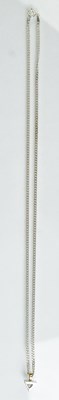 Lot 801 - A 9ct white and yellow gold triangular pendant...