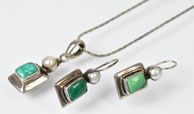 Lot 1072 - A 925 silver rectangular pendant set with a...