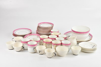 Lot 1379 - An early 20th century tea service with pink...