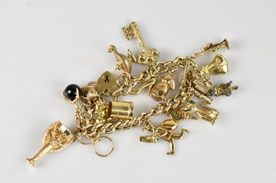 Lot 69 - A good 9ct yellow gold curb link bracelet with...