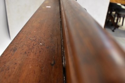 Lot 5 - A pitch pine church pew with Gothic-style ends,...
