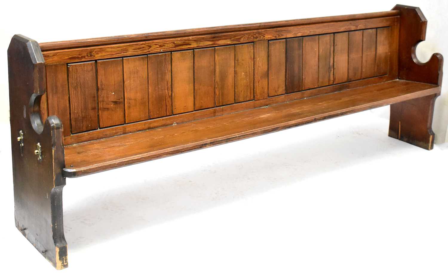 Lot 3 - A pitch pine church pew with Gothic-style ends,...