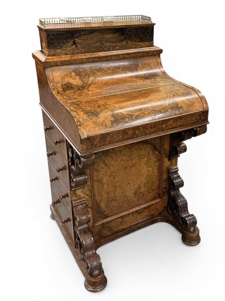Lot 12 - A Victorian burr walnut piano top Davenport...