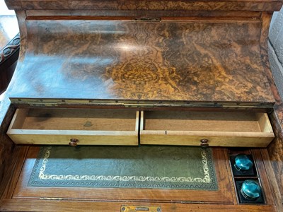 Lot 12 - A Victorian burr walnut piano top Davenport...