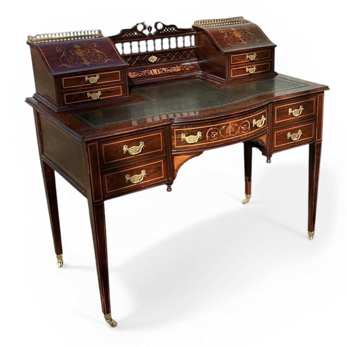 Lot 9 - An Edwardian rosewood and satinwood inlaid...