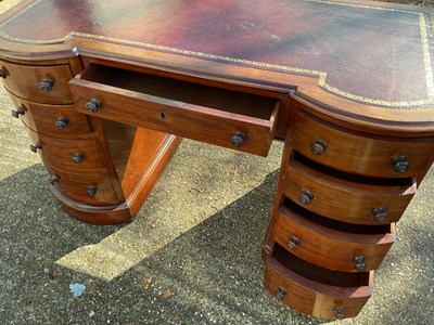 Lot 40 - A late Victorian mahogany kneehole desk, with...
