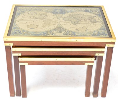Lot 31 - A nest of mid-20th century tables, the tops...
