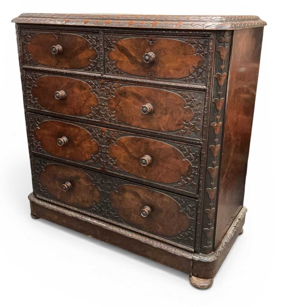 Lot 21 - A large Victorian heavily carved burr walnut...
