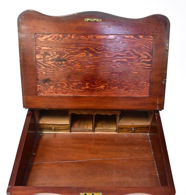 Lot 37 - A Victorian walnut Davenport with four...