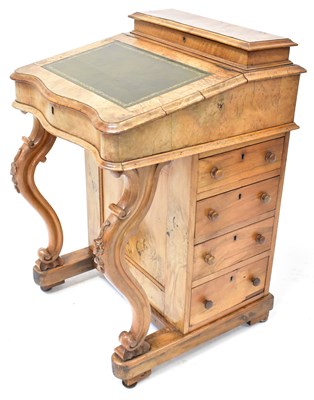 Lot 37 - A Victorian walnut Davenport with four...