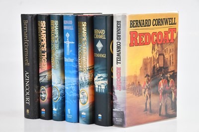 Lot 423 - BERNARD CORNWELL; seven signed first editions,...