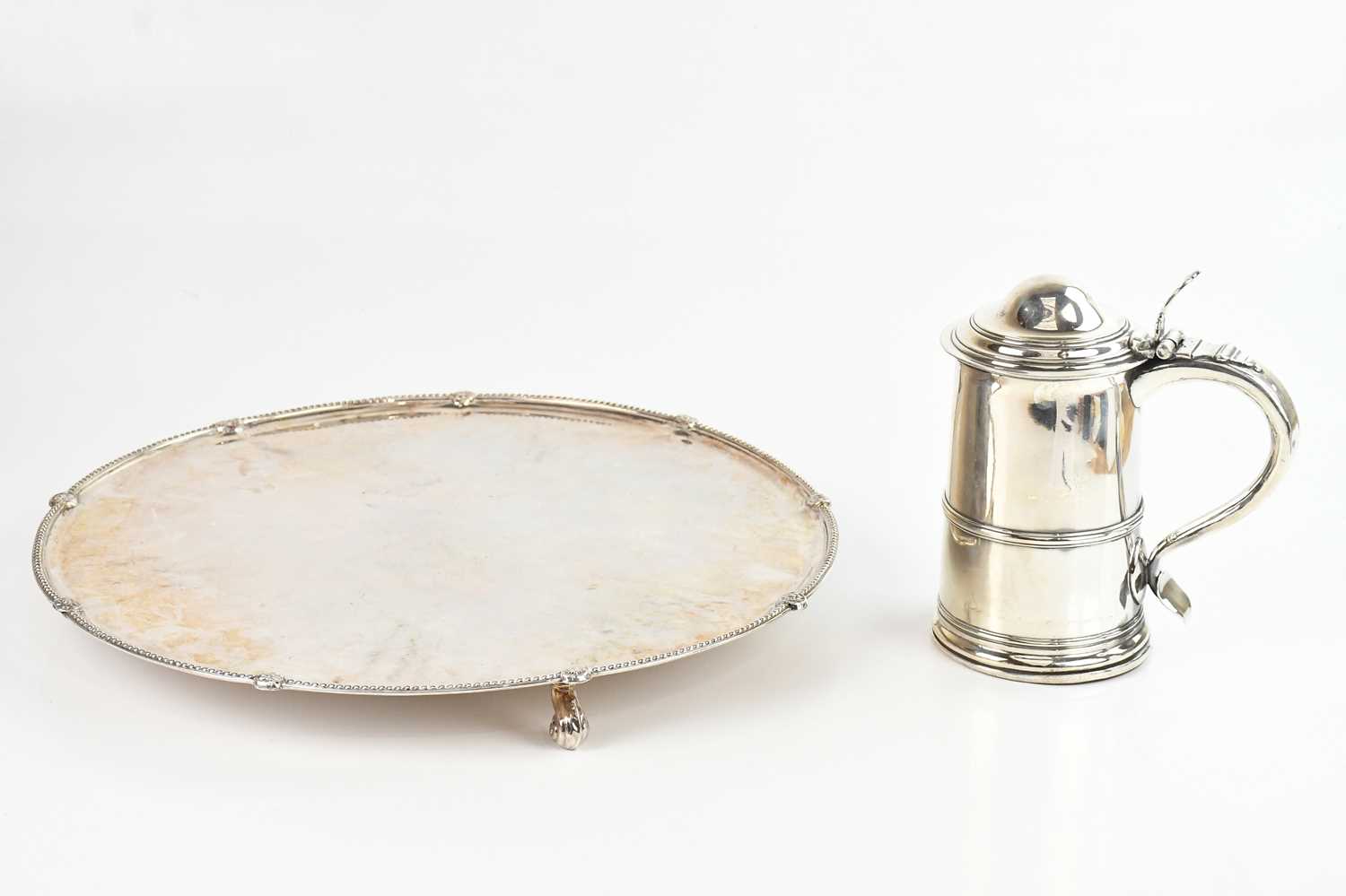 Lot 5 - A large metal salver, with heavily rubbed...