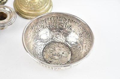Lot 9 - An Indian metal bowl decorated with birds and...