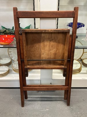Lot 34 - A pair of George VI 1944 folding stained pine...