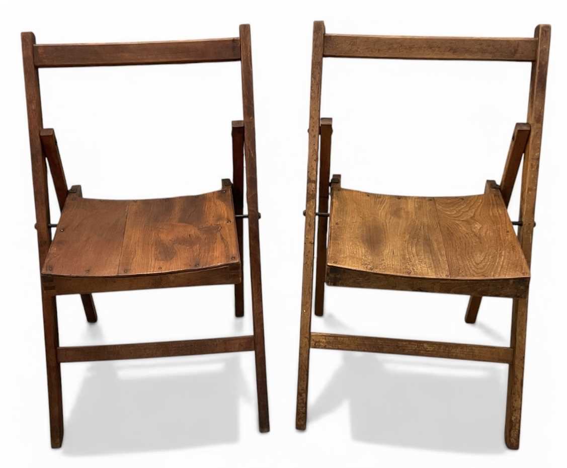 Lot 34 - A pair of George VI 1944 folding stained pine...