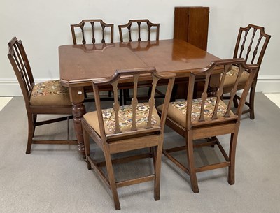 Lot 2048 - A Victorian walnut extending dining table with...