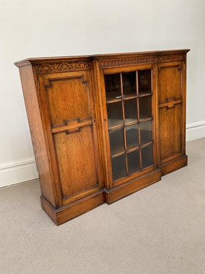 Lot 2049 - An early 20th century carved oak breakfront...