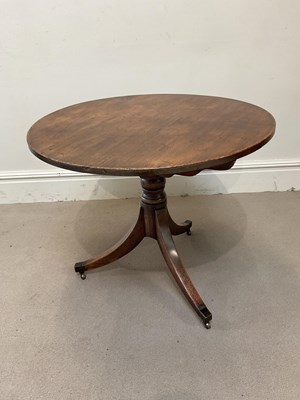 Lot 221 - A Georgian mahogany tilt top tripod table.
