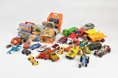 Lot 2362 - A collection of boxed and loose diecast toys,...