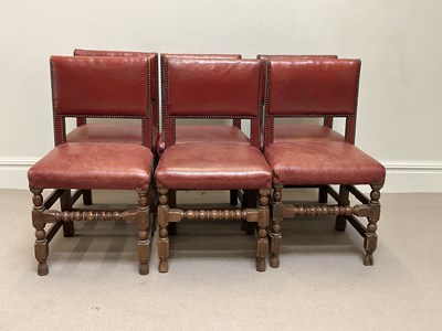 Lot 2045 - A set of six oak framed dining chairs with red...