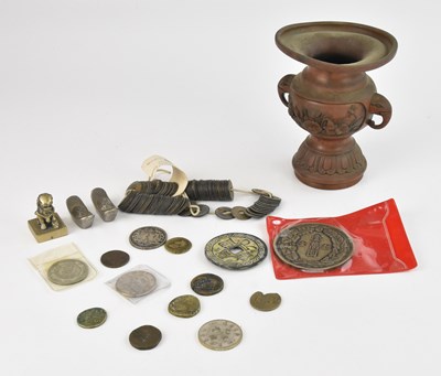 Lot 1049 - A collection of Chinese coins on a string,...