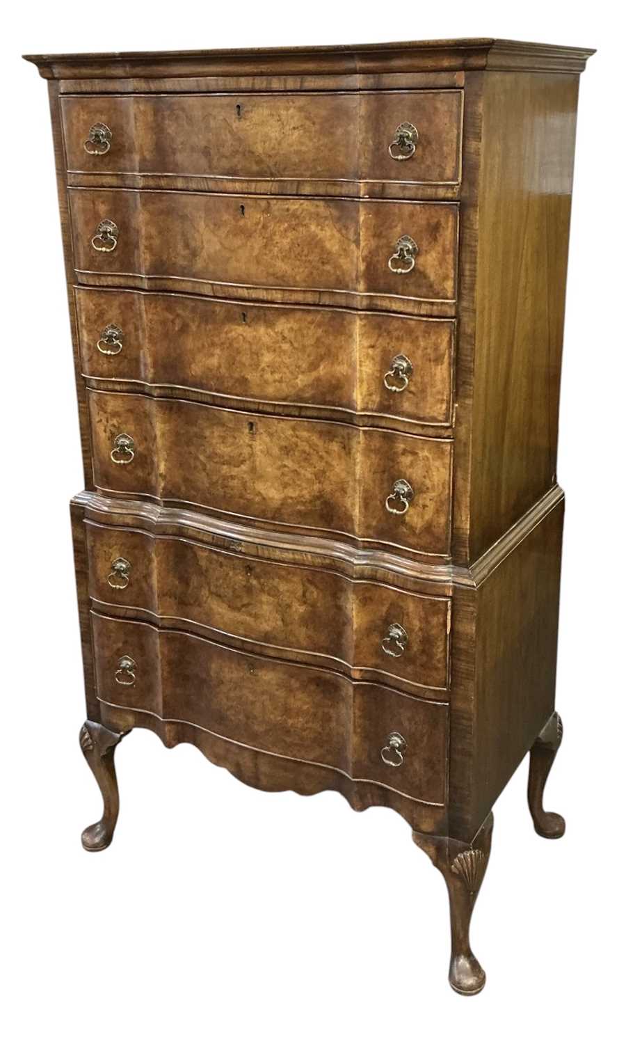 Lot 29 - A 1930s walnut chest on chest, with six long...