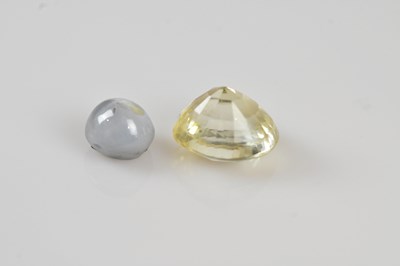 Lot 52 - LOOSE GEMSTONES; a star sapphire 5.3mm x 6.7mm...