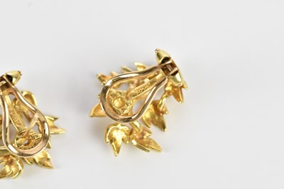 Lot 246 - A pair of textured yellow metal ear studs...