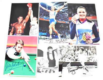 Lot 649 - KELLY HOLMES; three signed colour photographs;...