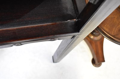 Lot 40 - A Chinese hardwood two-tier occasional table,...