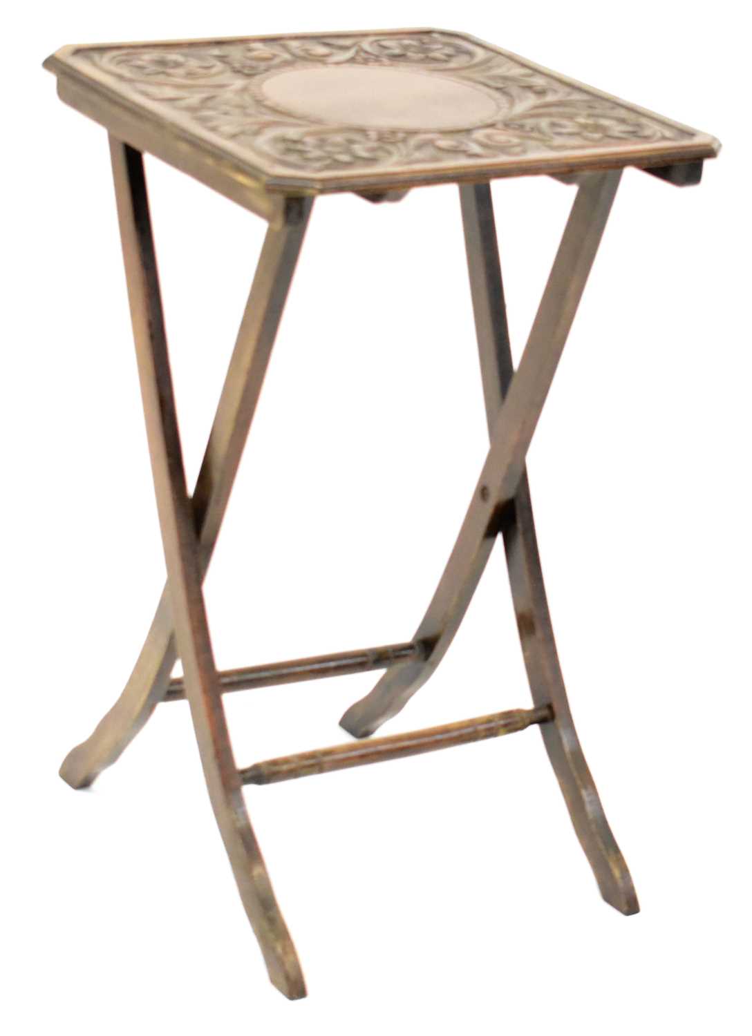 Lot 25 - An early 20th century carved oak folding side...