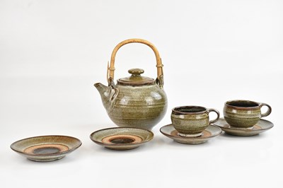 Lot 1308 - A studio pottery teapot, two cups and four...