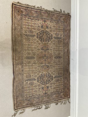 Lot 280 - A large Eastern rug decorated with stylised...