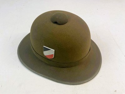 Lot 207 - A WWII Afrika Korps safari hat, with metal...