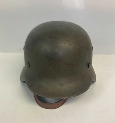 Lot 214 - A WWII M35 German SS helmet with emblems...