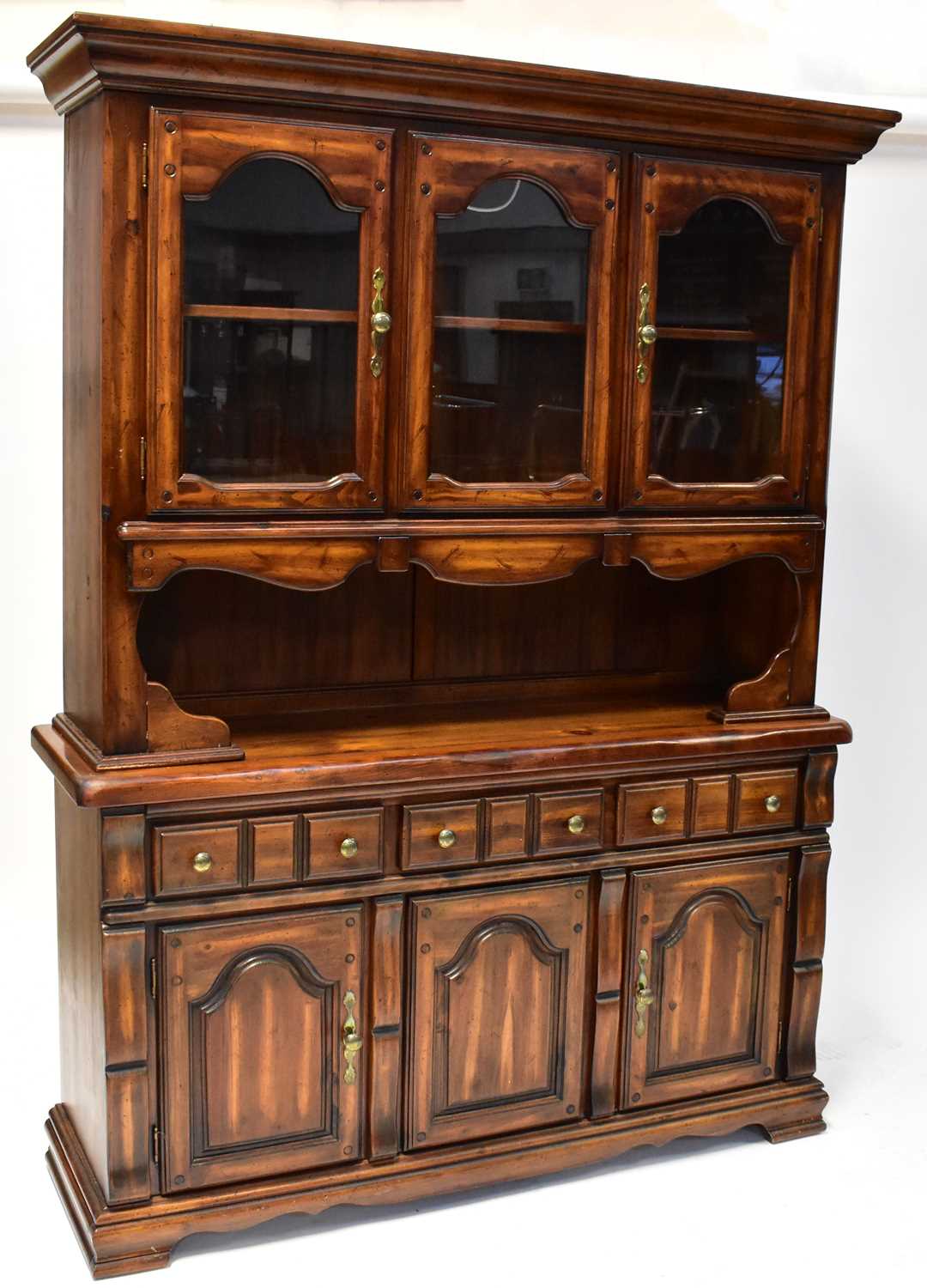 Lot 13 - A reproduction dresser, the moulded cornice...