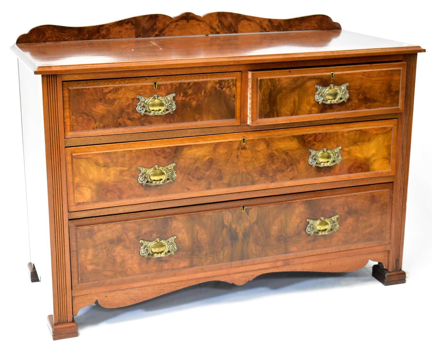 Lot 15 - An early 20th century mahogany chest of two...
