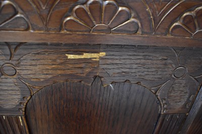 Lot 7 - A reproduction oak monk's bench, with box seat...