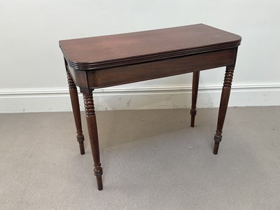 Lot 2051 - A 19th century mahogany fold-over tea table,...