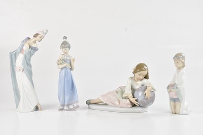 Lot 1221 - LLADRO; a group of four figures comprising...