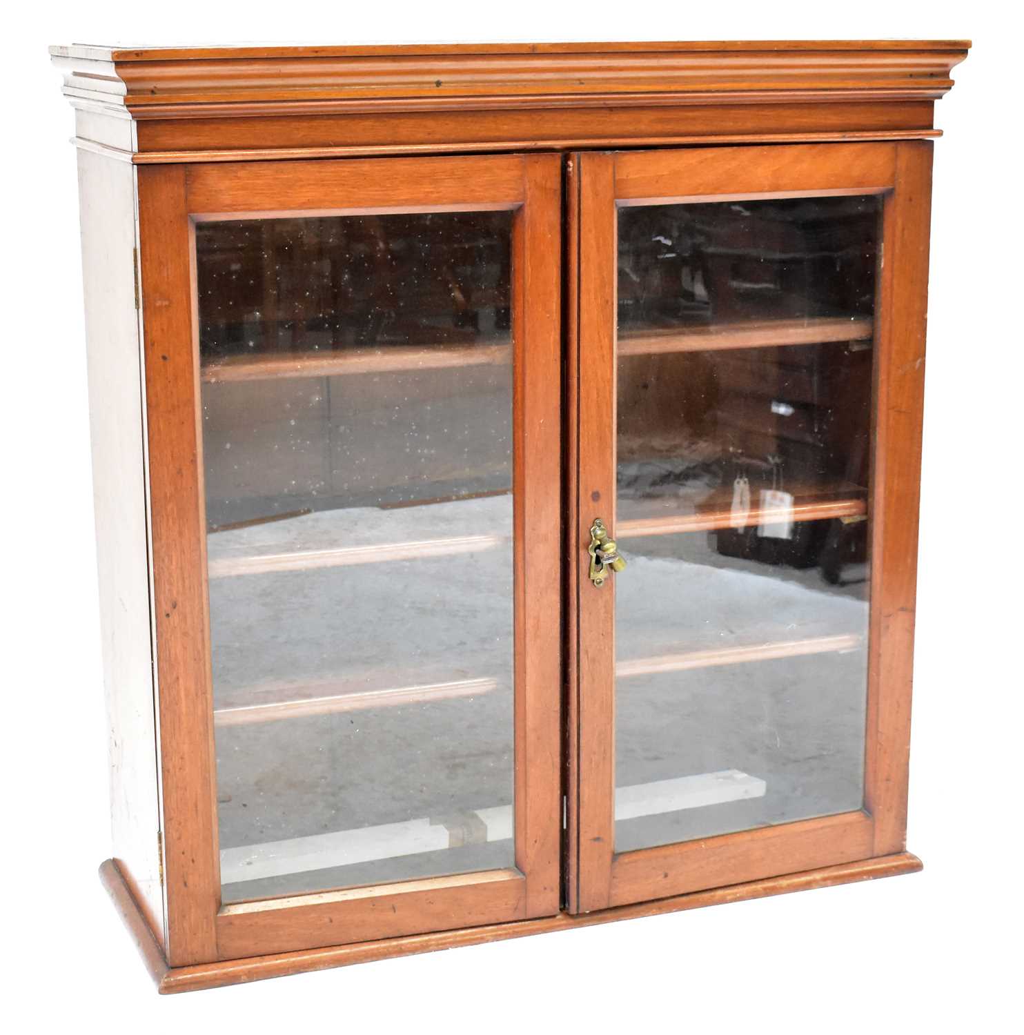 Lot 11 - An Edwardian mahogany glazed cupboard with...