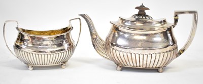 Lot 694 - A George III hallmarked silver matched part...