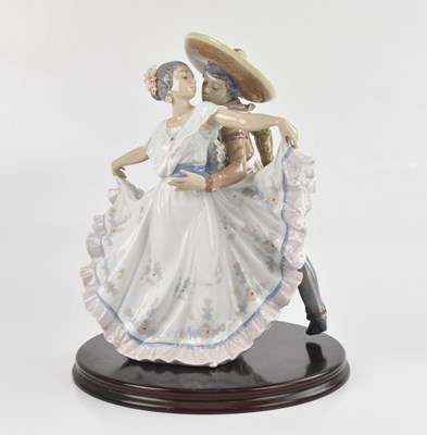 Lot 1209 - LLADRO; a ceramic figure group, Mexican...