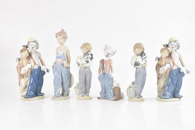 Lot 1205 - LLADRO; three ceramic figures of clowns, ‘Pals...