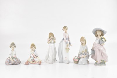Lot 1207 - LLADRO; six ceramic figures, ‘Fallas Queen’...