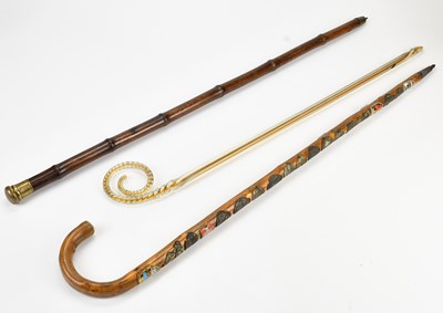 Lot 458 - An early 20th century bamboo walking cane with...