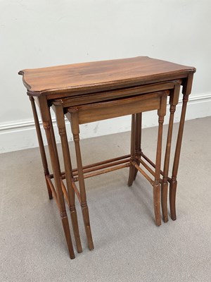 Lot 153 - An Edwardian mahogany quartet of coffee tables...