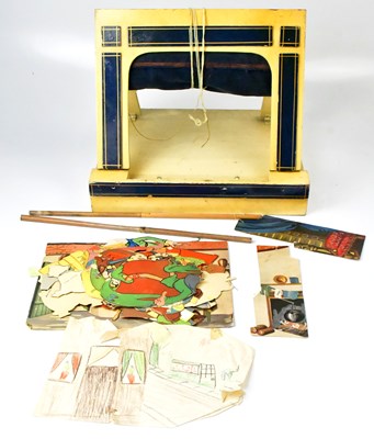 Lot 408 - TRI-ANG; a tabletop wooden theatre, with easel...