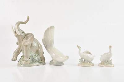 Lot 1224 - NAO; an elephant, height 21cm, with three...
