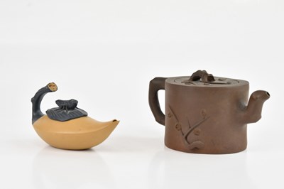Lot 1052 - A Chinese teapot, decorated with branches, and...
